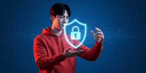 A Korean person holding a digital shield with a lock symbol, protecting against streams of data and cyber threats, minimalist composition with blue digital background, professional lighting, modern aesthetic